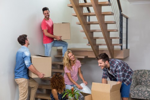 Furniture being moved from a Pentonville flat with stair access