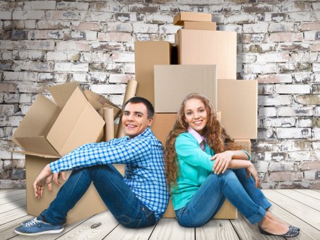 Fragile item packing with protective materials and labelled boxes