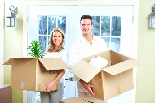 Staff following safe working procedures during a move
