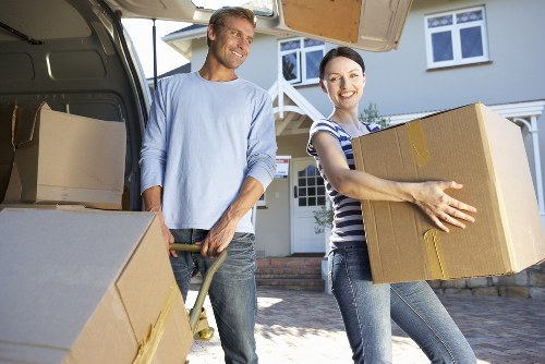 Local moving team handling house removals in Pentonville on a busy street