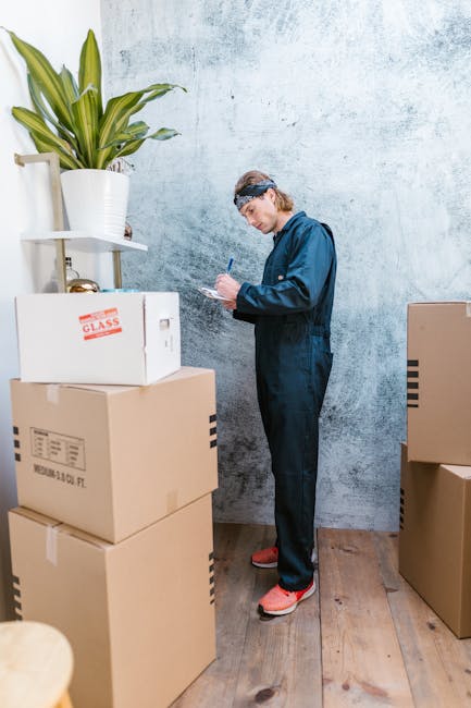 Close-up of a person holding a clipboard with a document titled 'Planning of reference in Land Board Point advisory' related to legal documentation for a home relocation or property transfer, while an